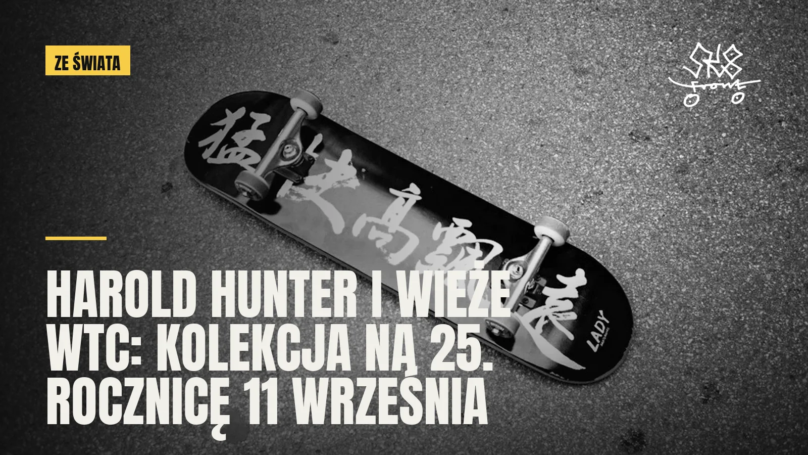 Deskorolka z grafiką leżąca na asfalcie